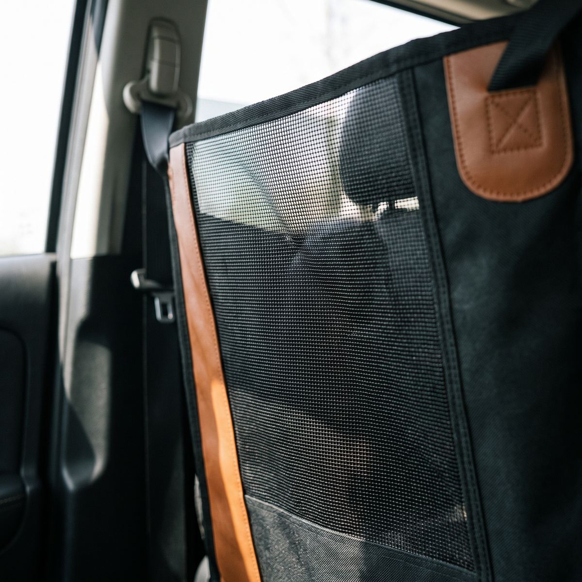 Close view of the mesh window and reinforced side panel